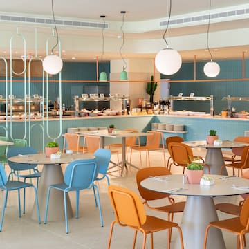 a restaurant with tables and chairs