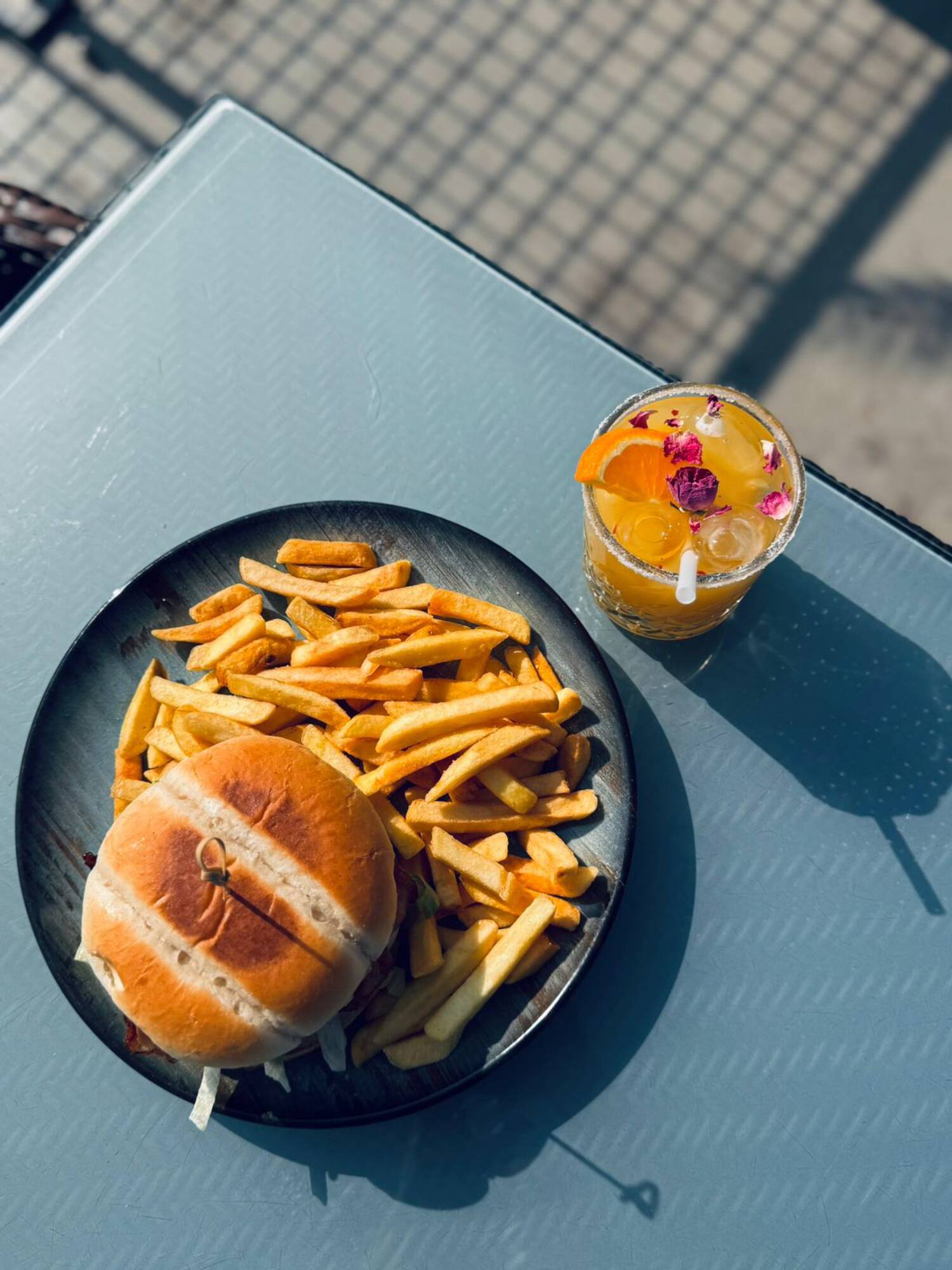 a plate of food and a drink on a table