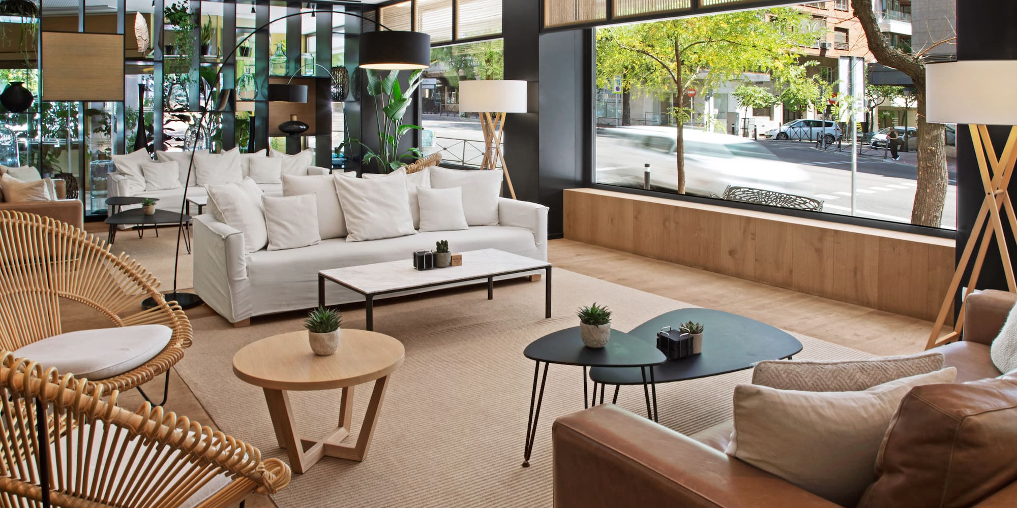 a room with a large window and a couch