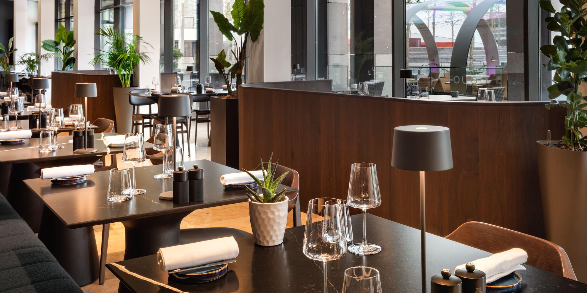 a restaurant with tables and chairs