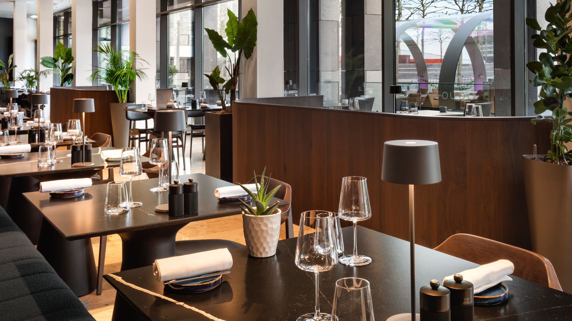 a restaurant with tables and chairs