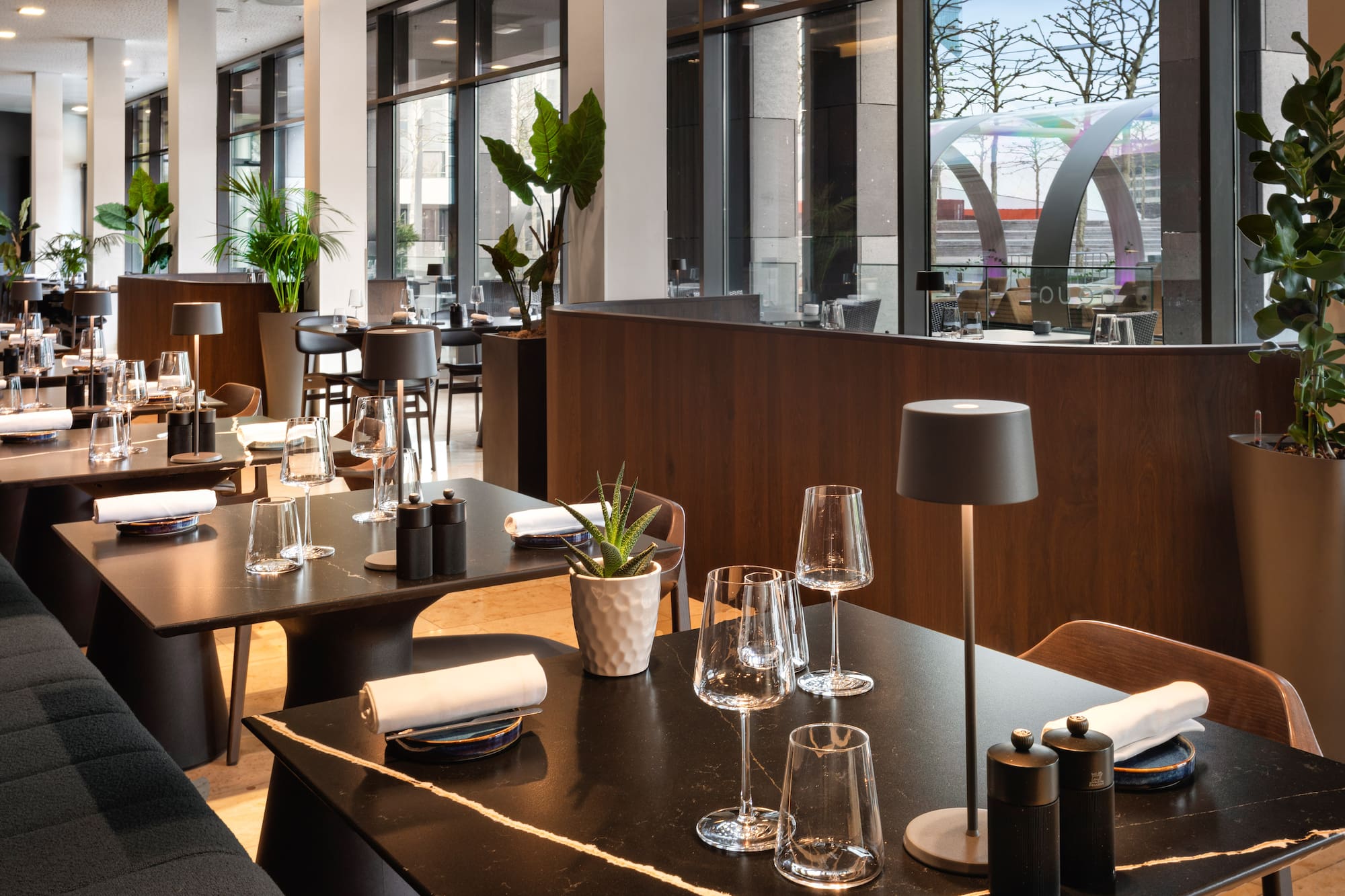 a restaurant with tables and chairs