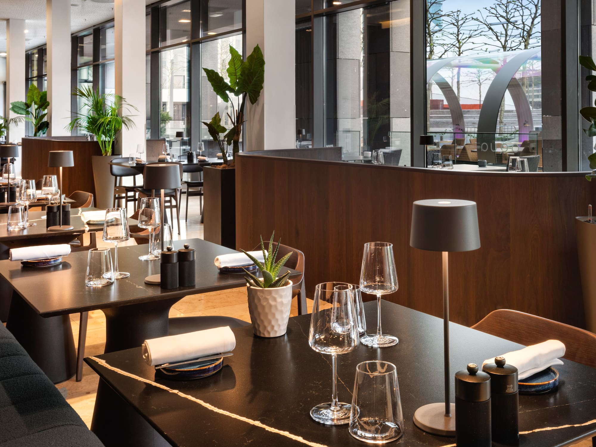 a restaurant with tables and chairs