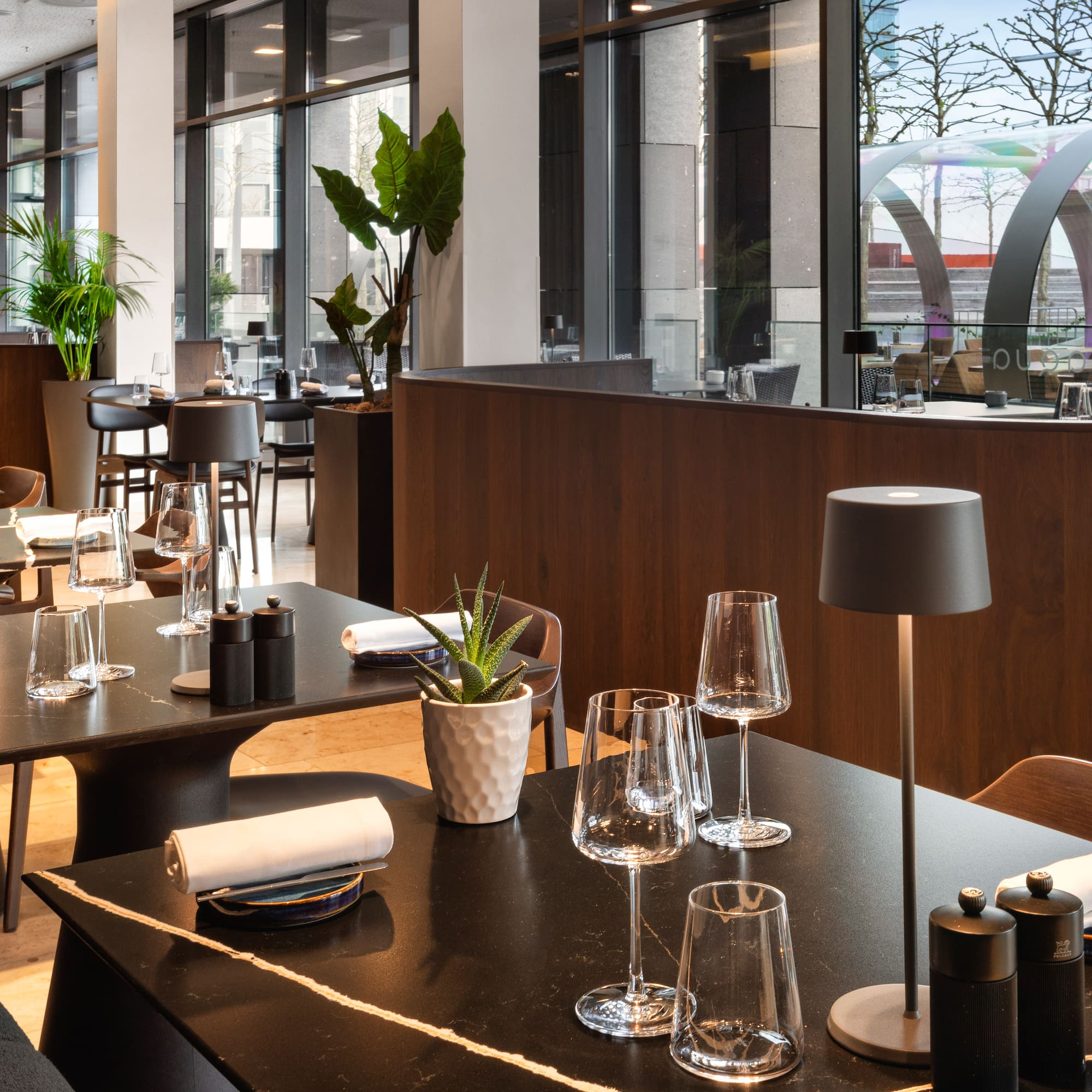 a restaurant with tables and chairs