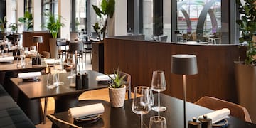 a restaurant with tables and chairs