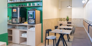 a room with tables and chairs