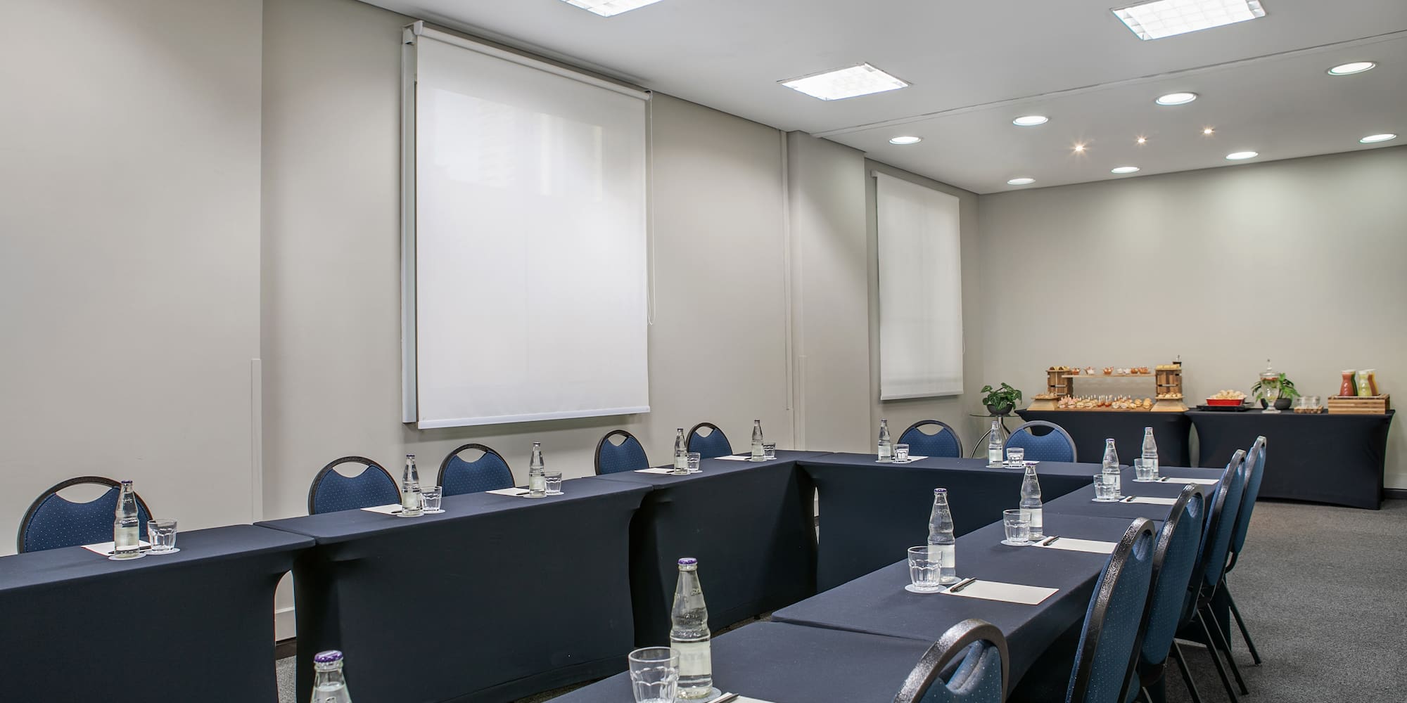 a room with tables and chairs