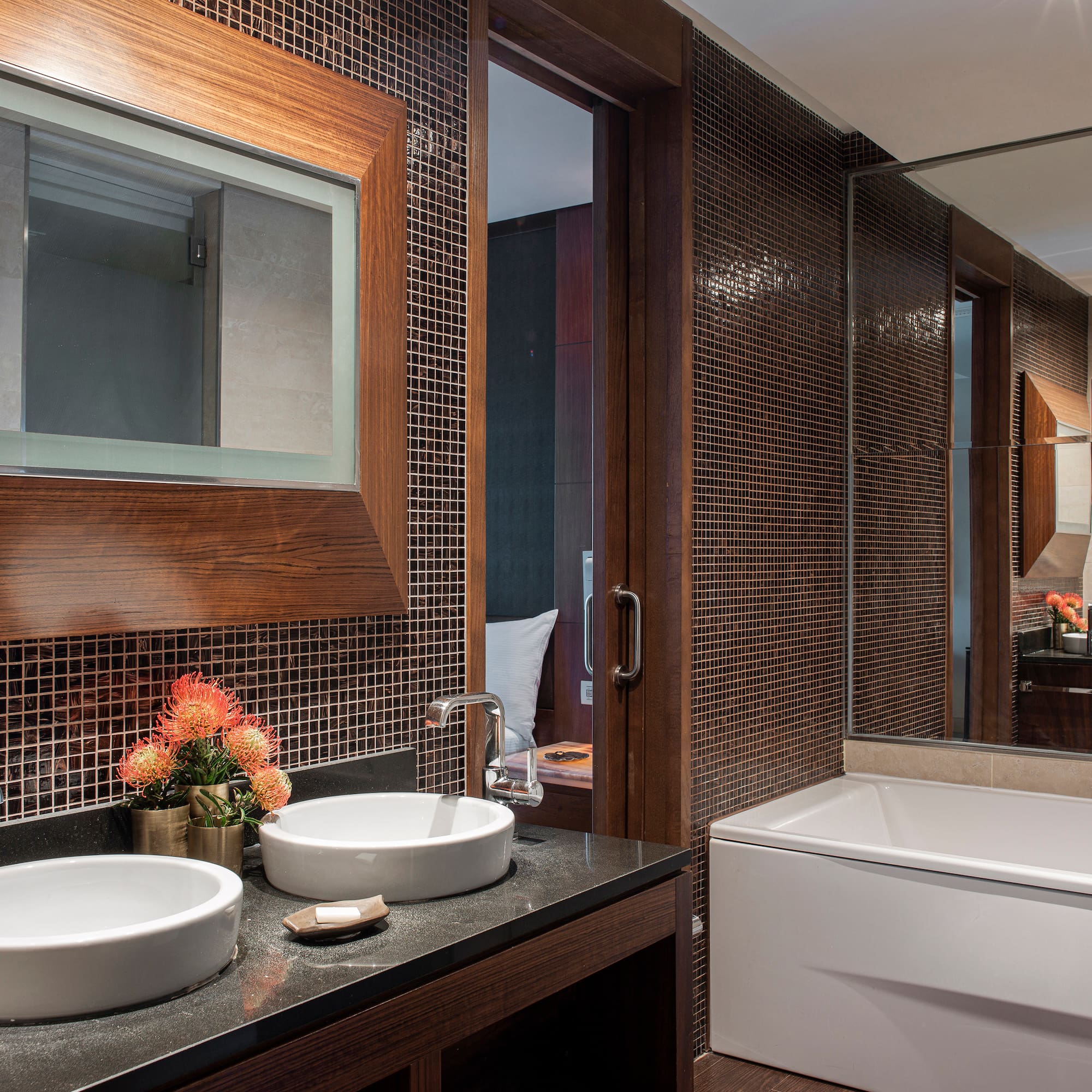 a bathroom with a mirror and sink