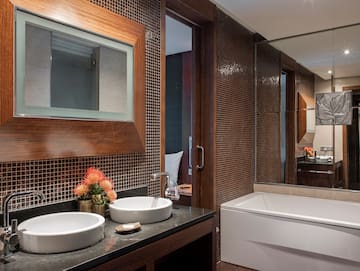 a bathroom with a mirror and sink