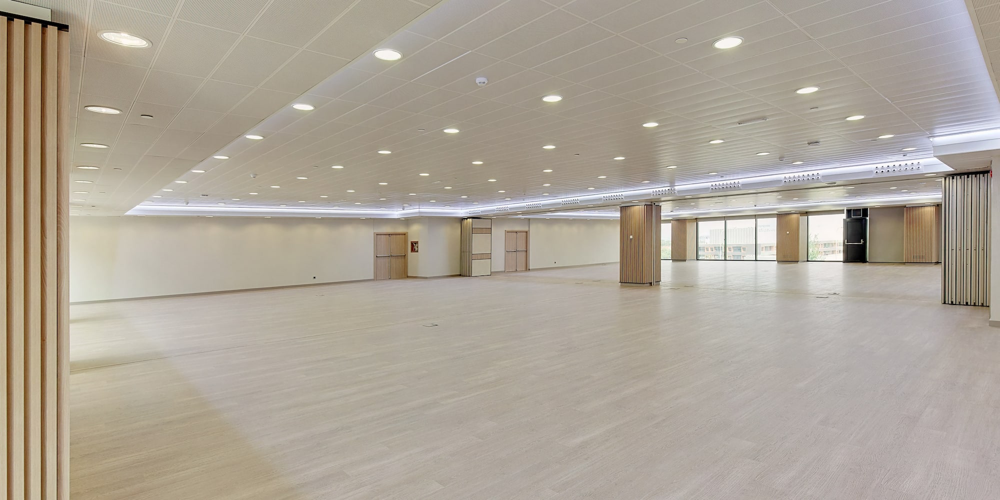 a large room with a wood floor