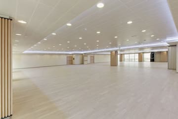 a large room with a wood floor