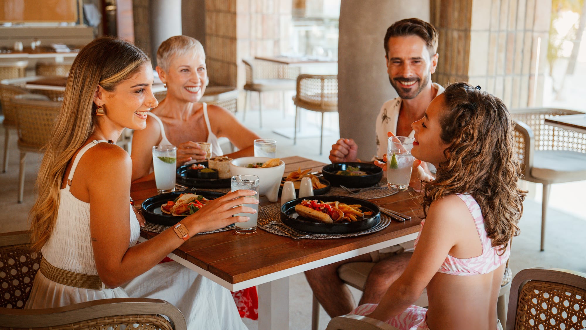 a group of people sitting at a table