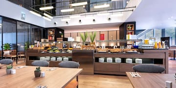 a restaurant with tables and chairs