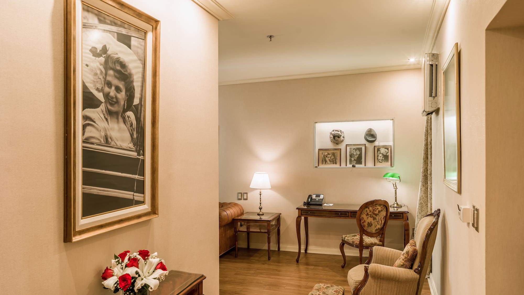 a room with a table and chairs