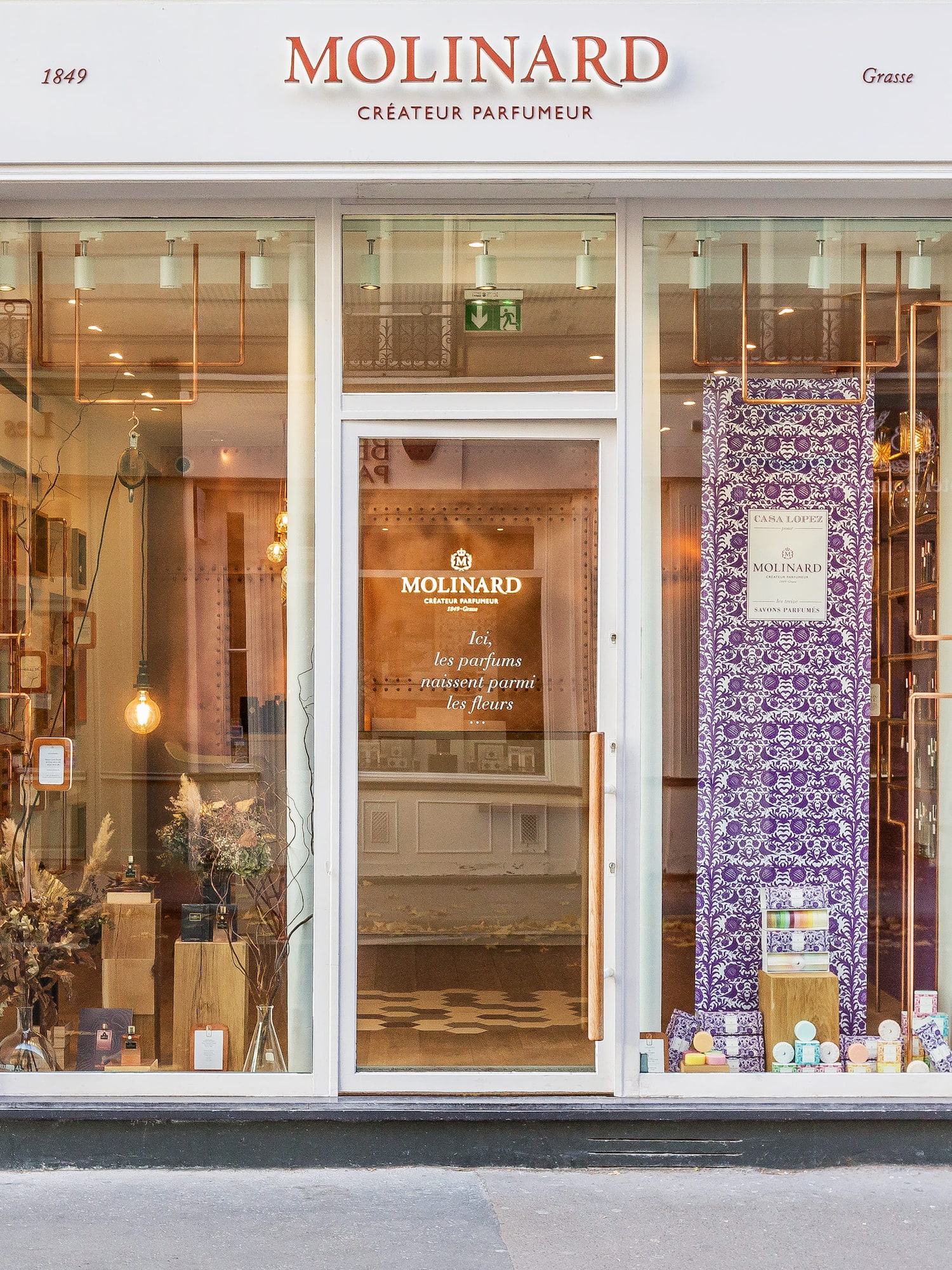 a store front with glass doors