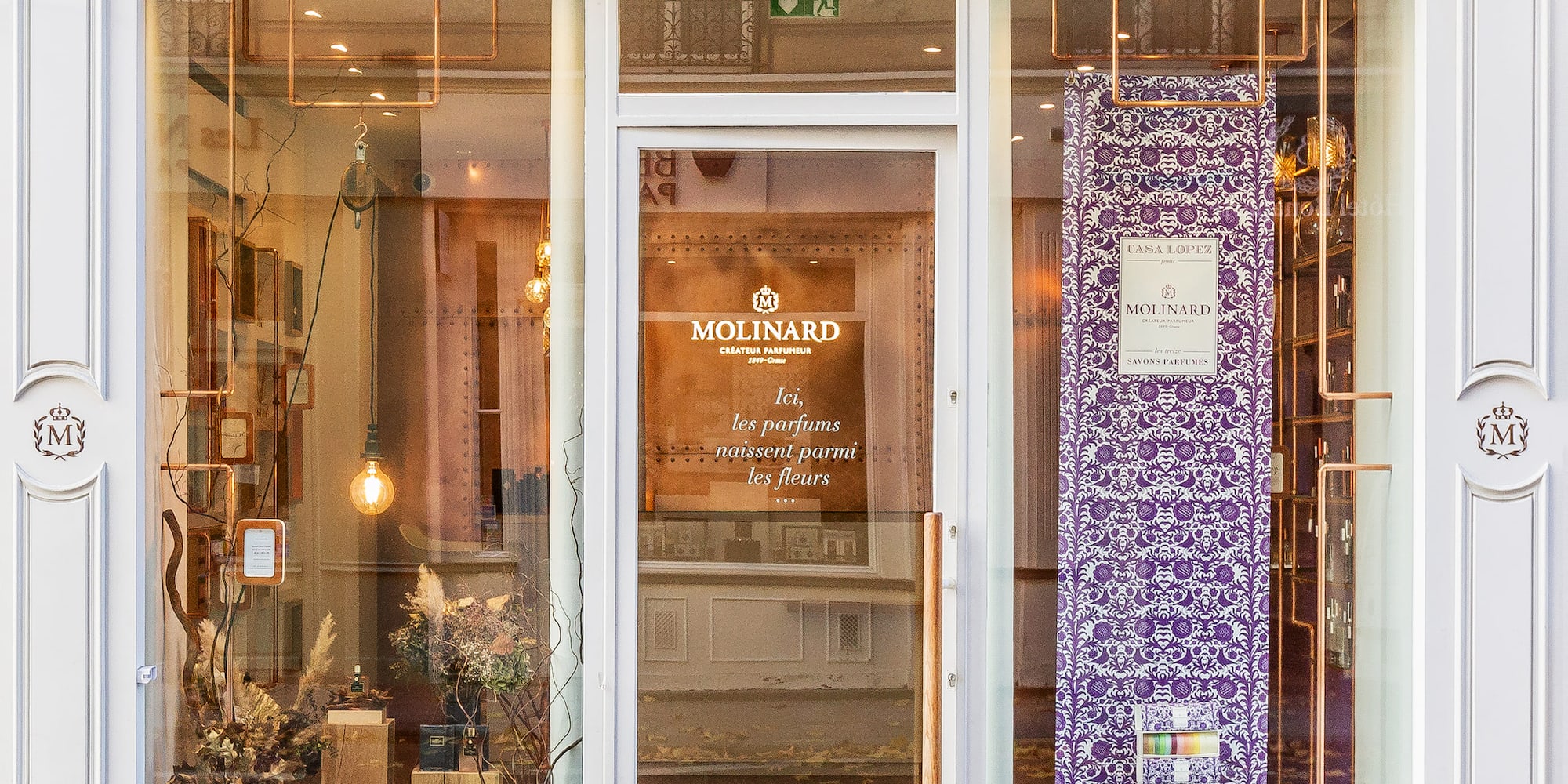 a store front with glass doors