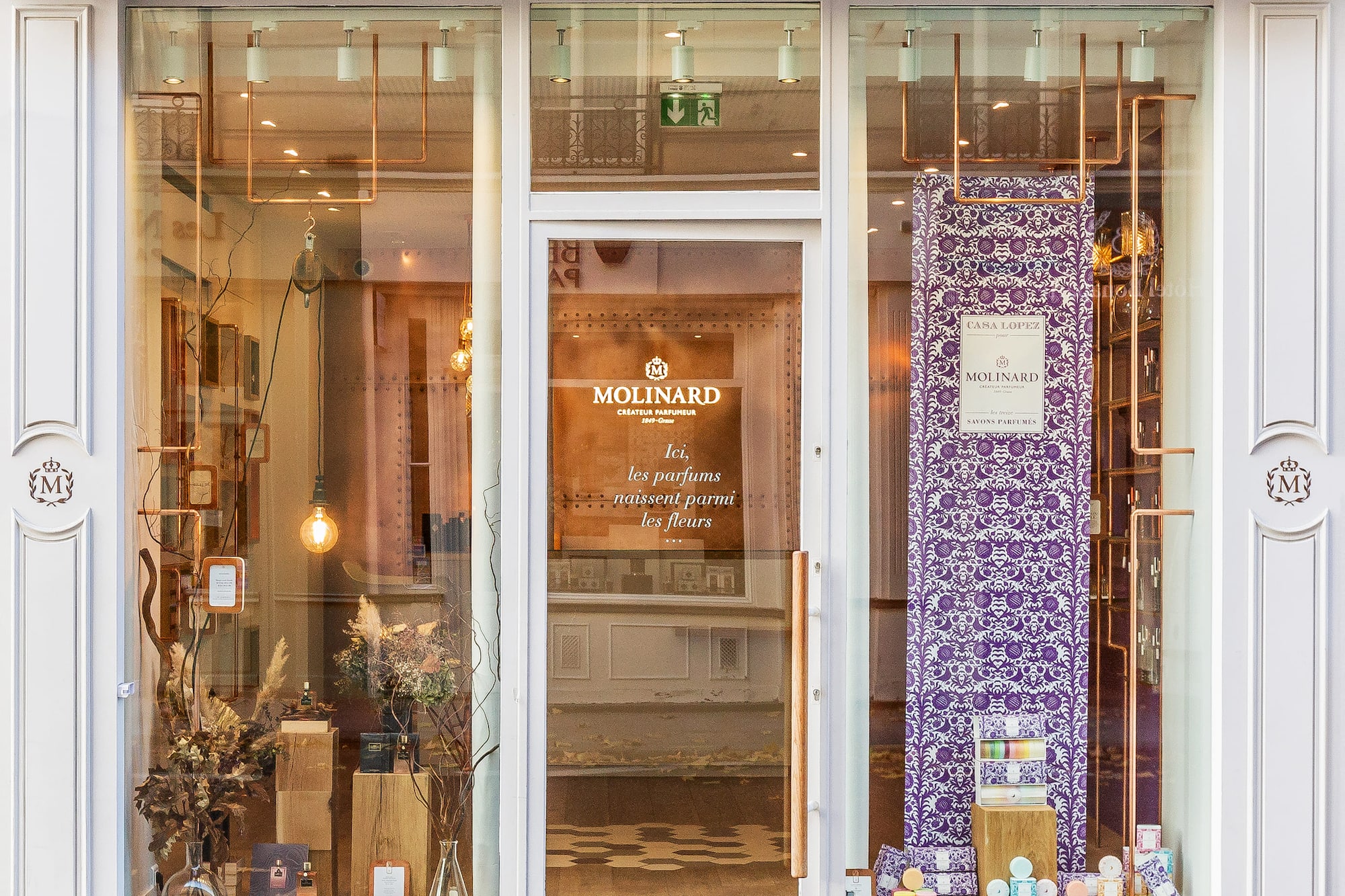 a store front with glass doors