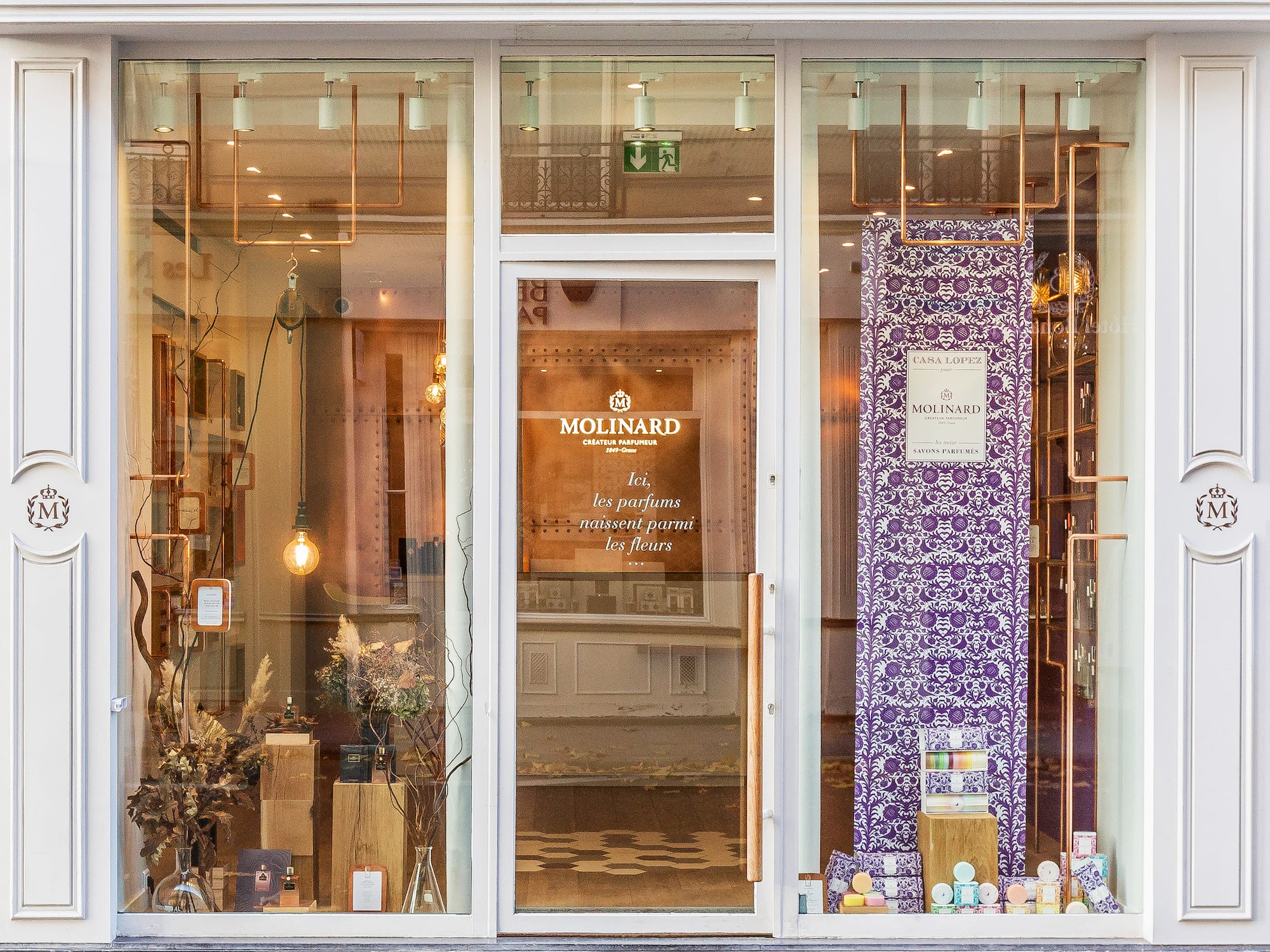 a store front with glass doors