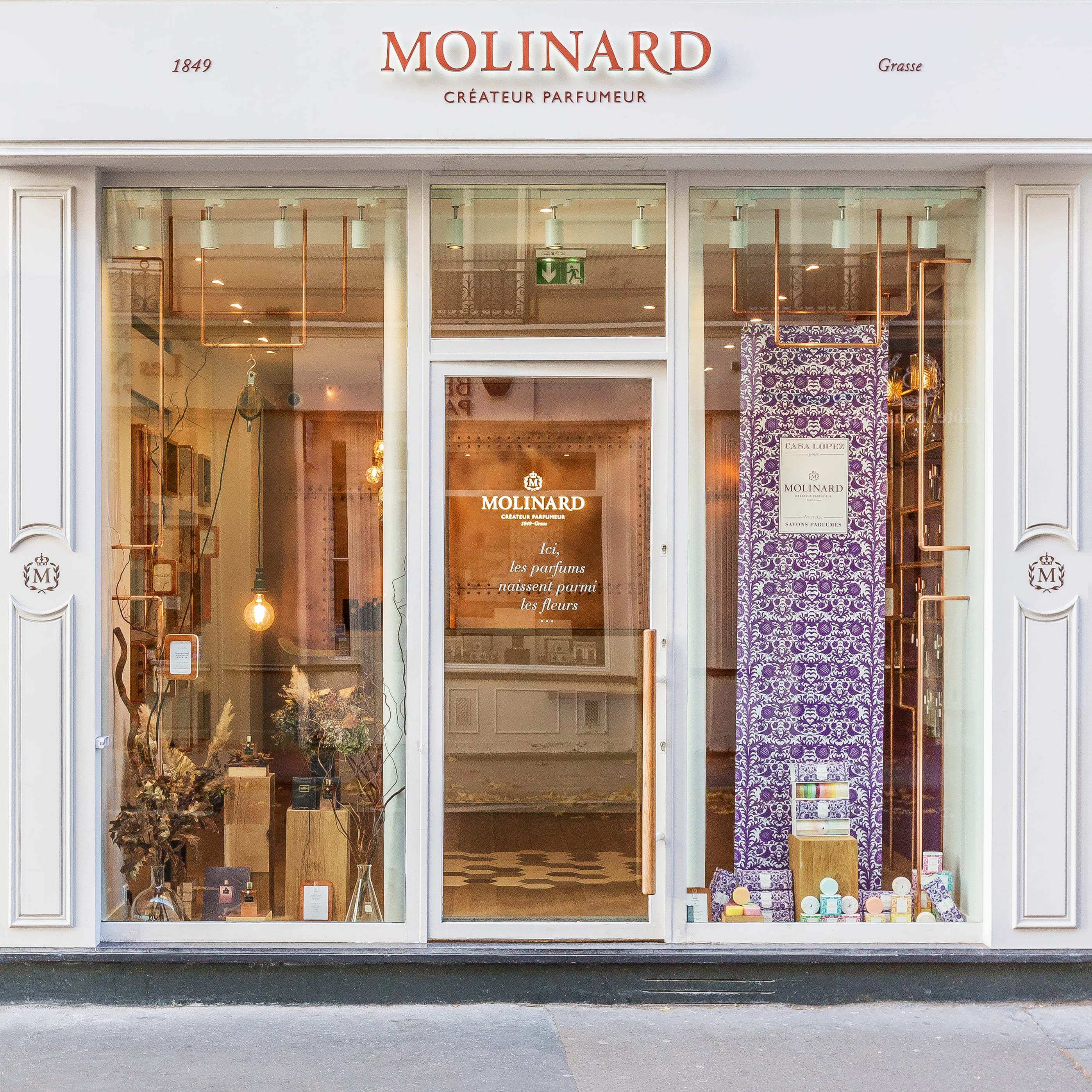 a store front with glass doors