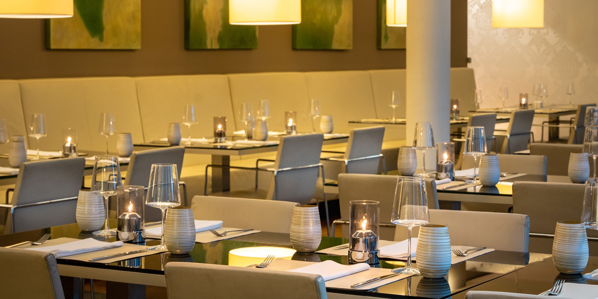 a restaurant with tables and chairs