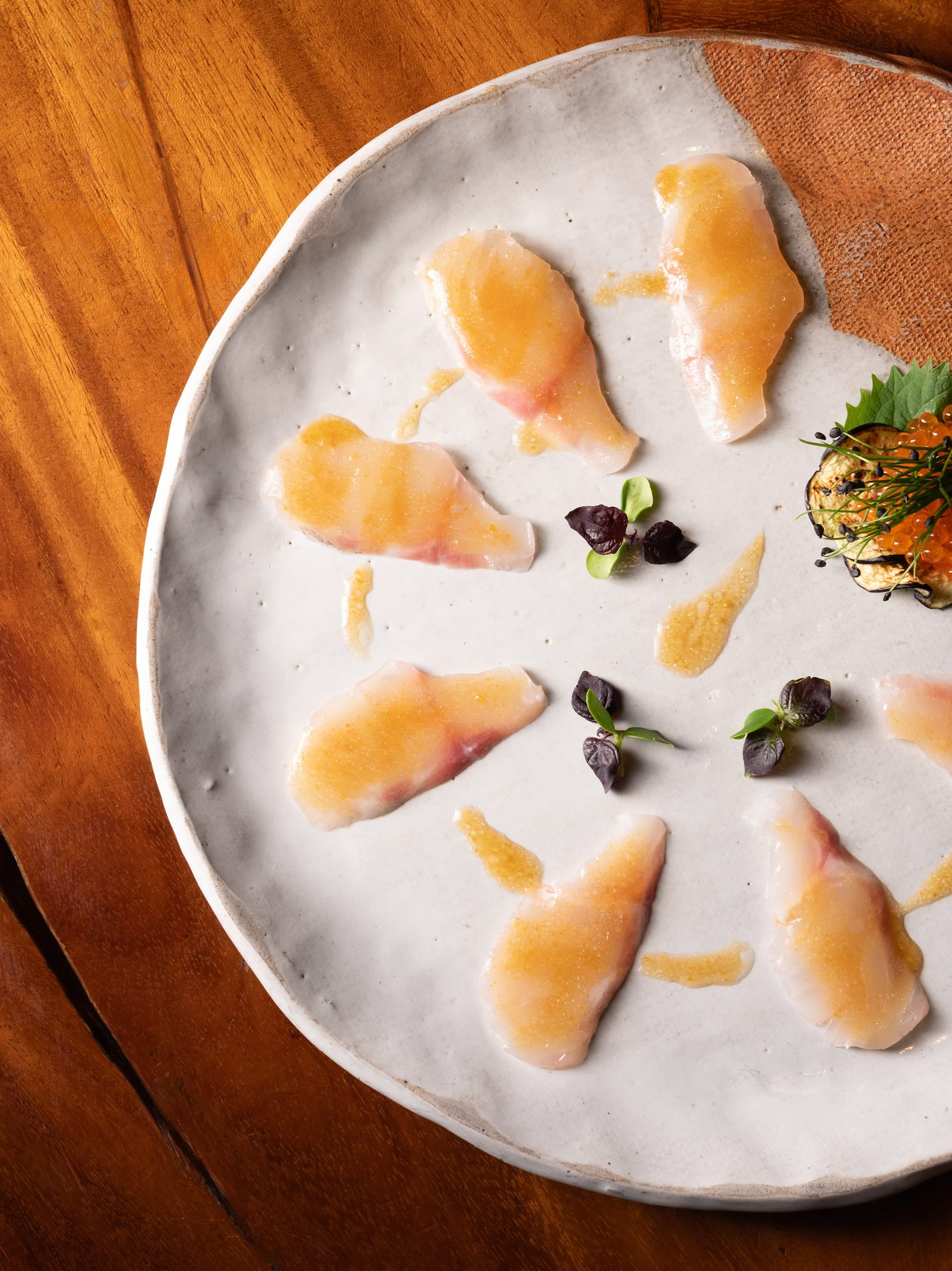 a plate of food on a wooden surface