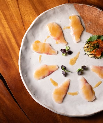 a plate of food on a wooden surface