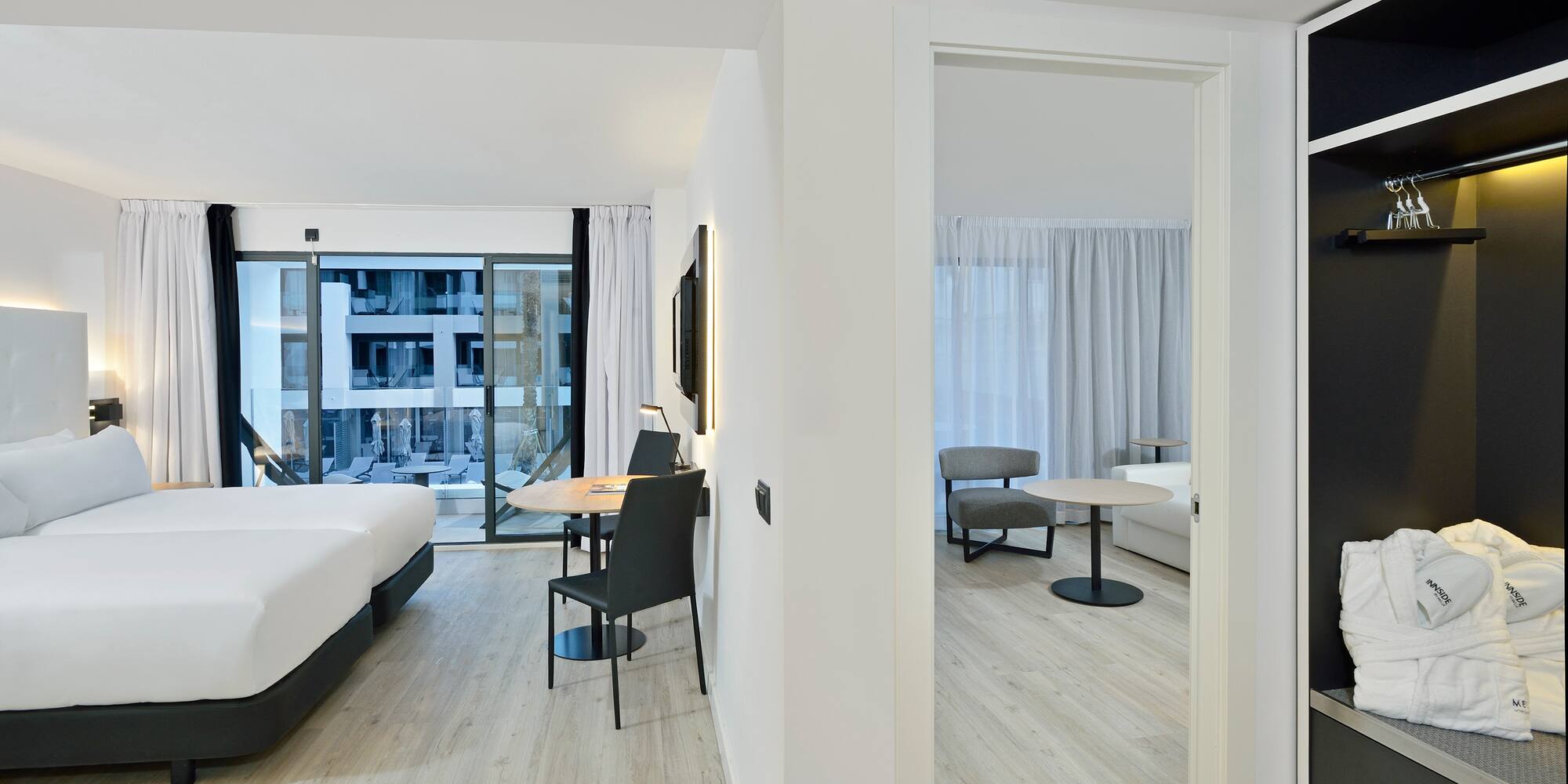 a room with a table and chairs