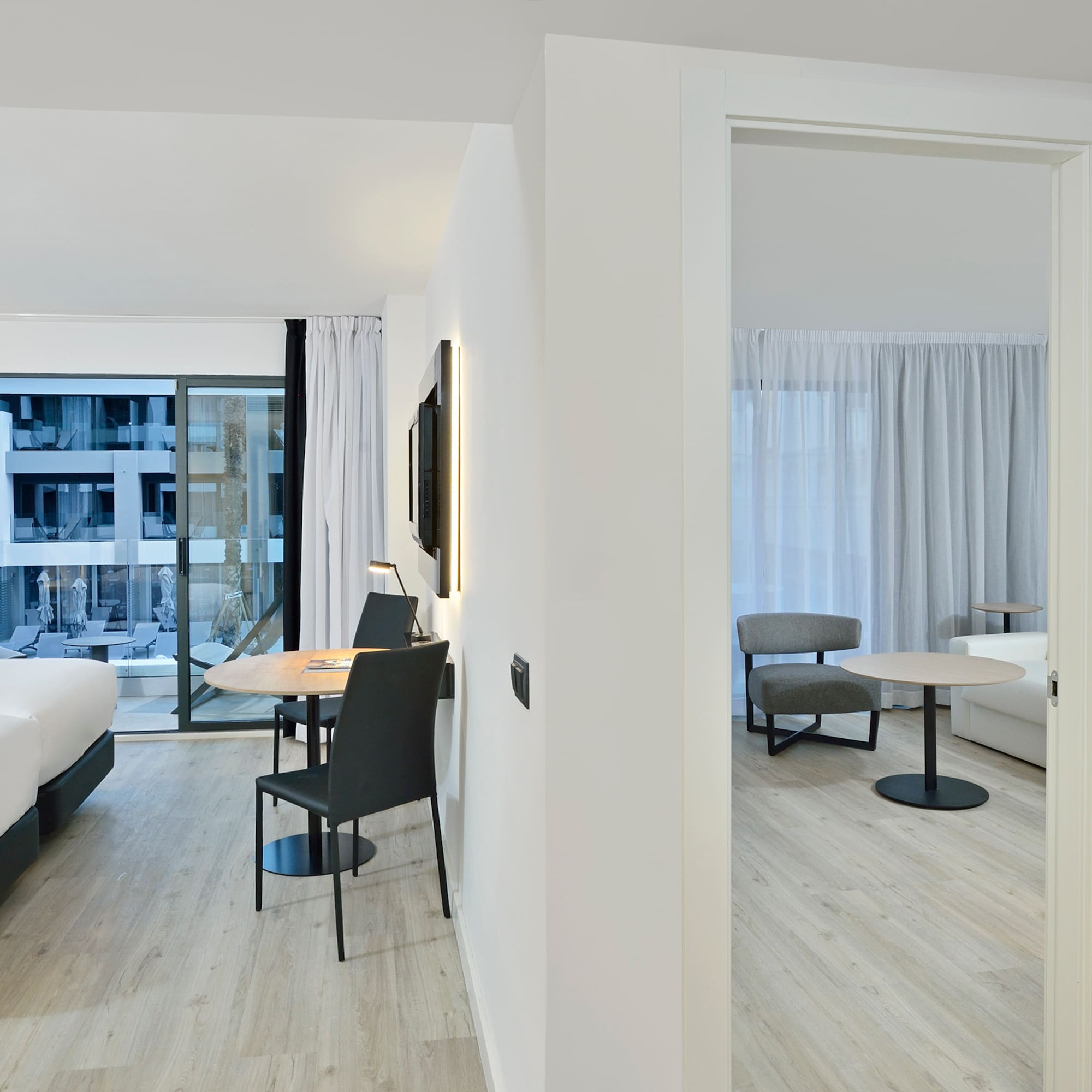 a room with a table and chairs