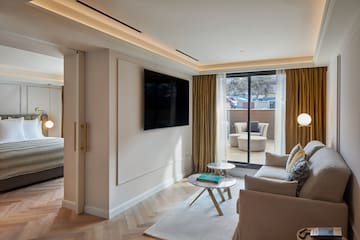 a living room with a tv on the wall