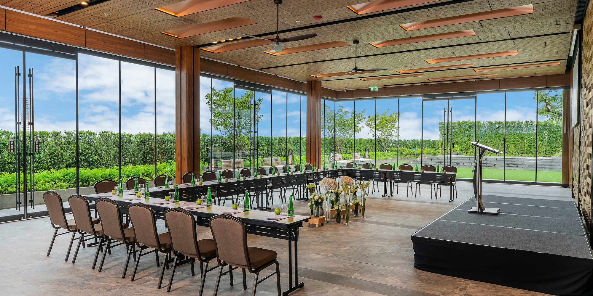a room with a large table and chairs