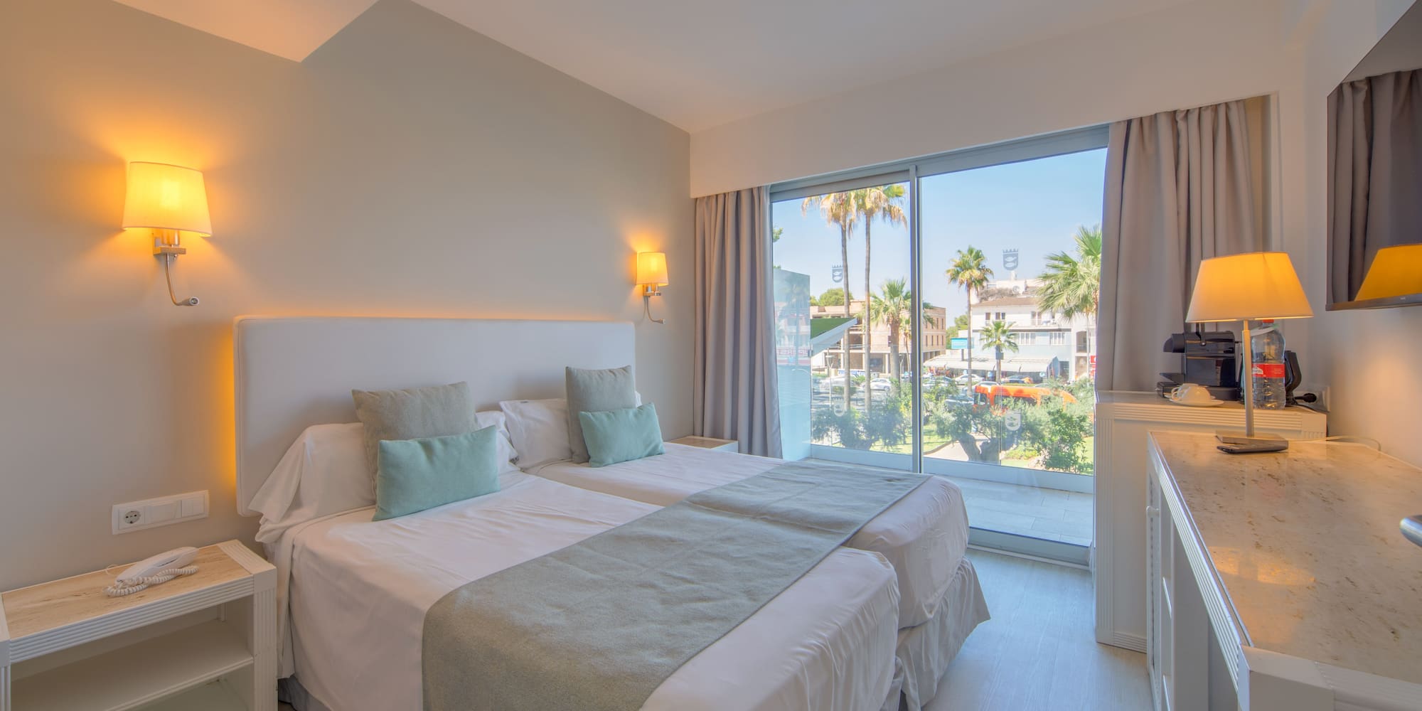 a bedroom with a double bed and a window