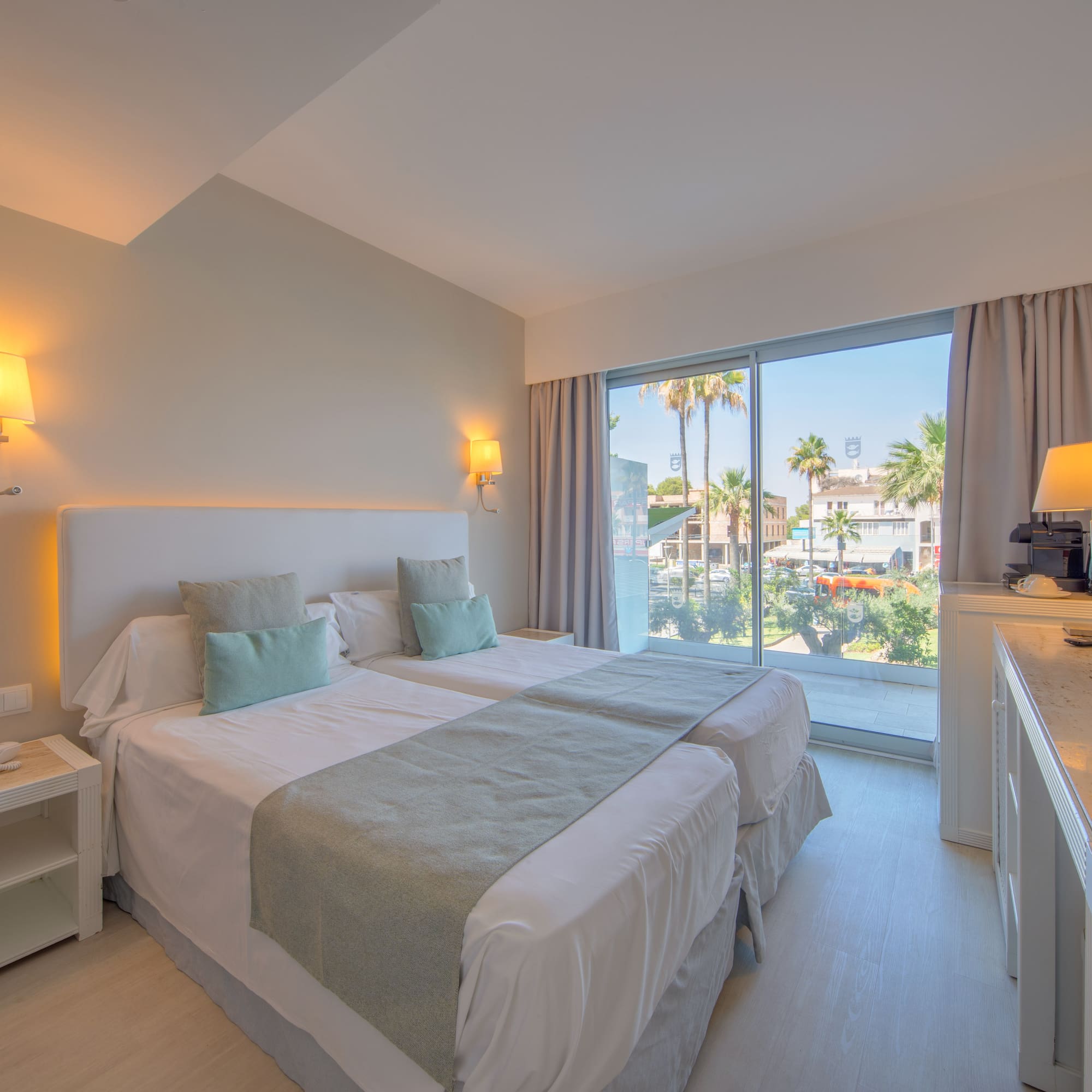 a bedroom with a double bed and a window