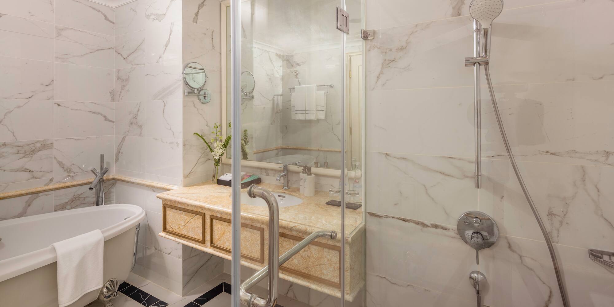 a bathroom with a shower and sink