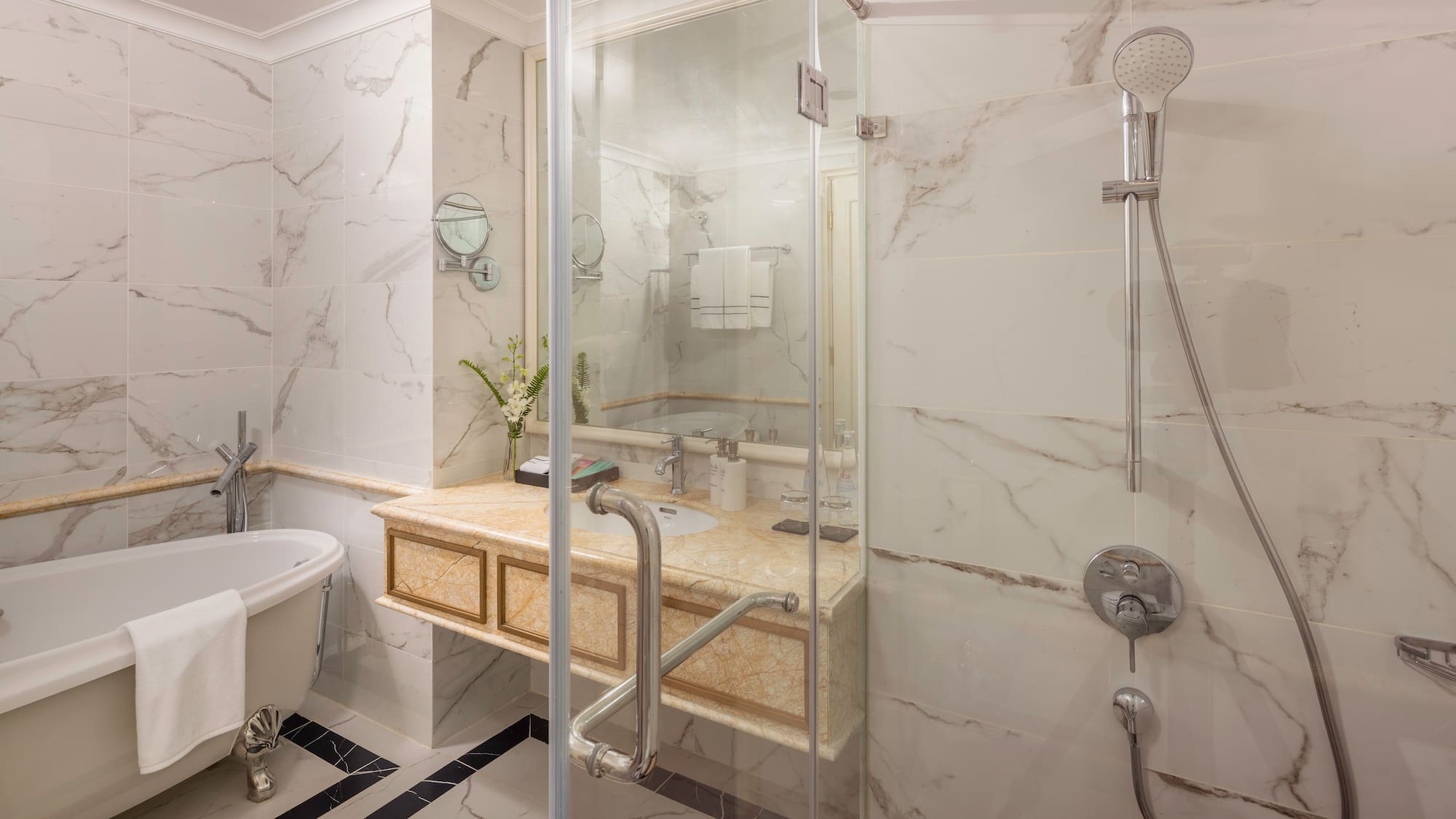 a bathroom with a shower and sink