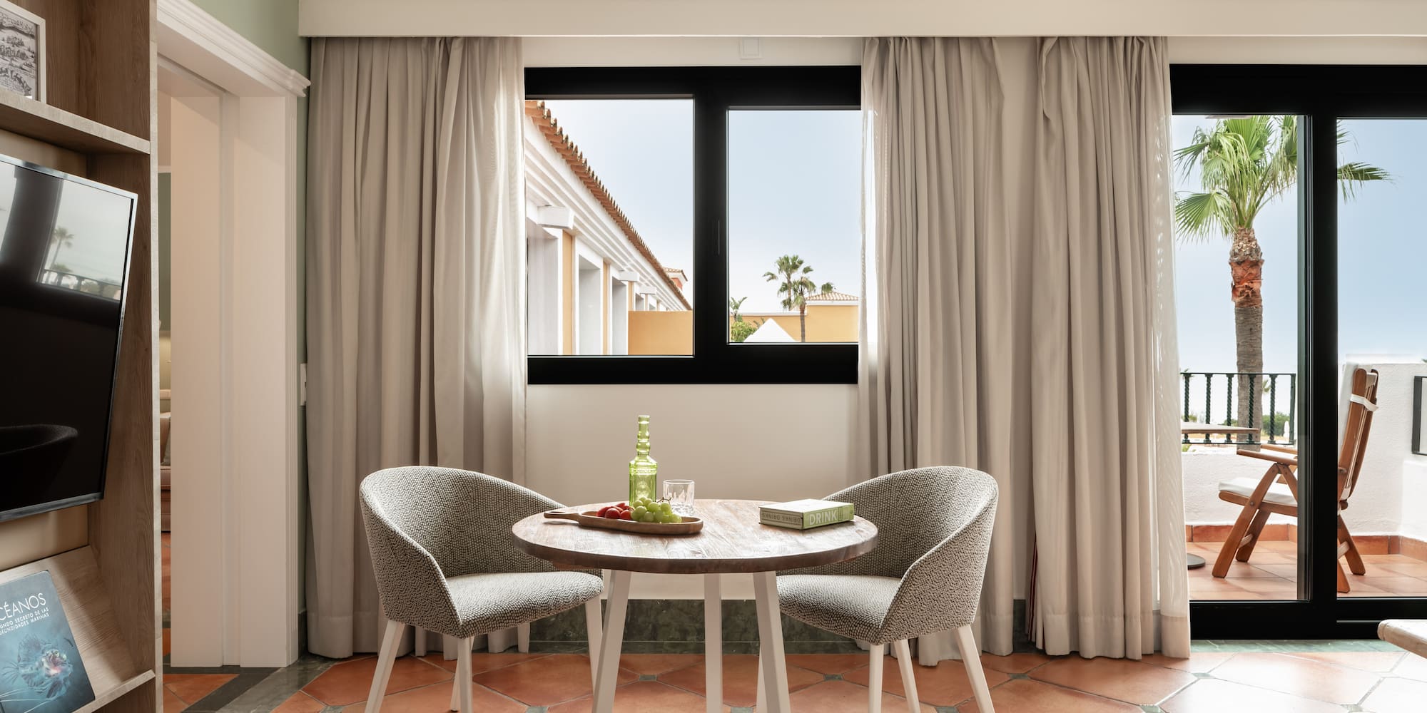 a room with a table and chairs