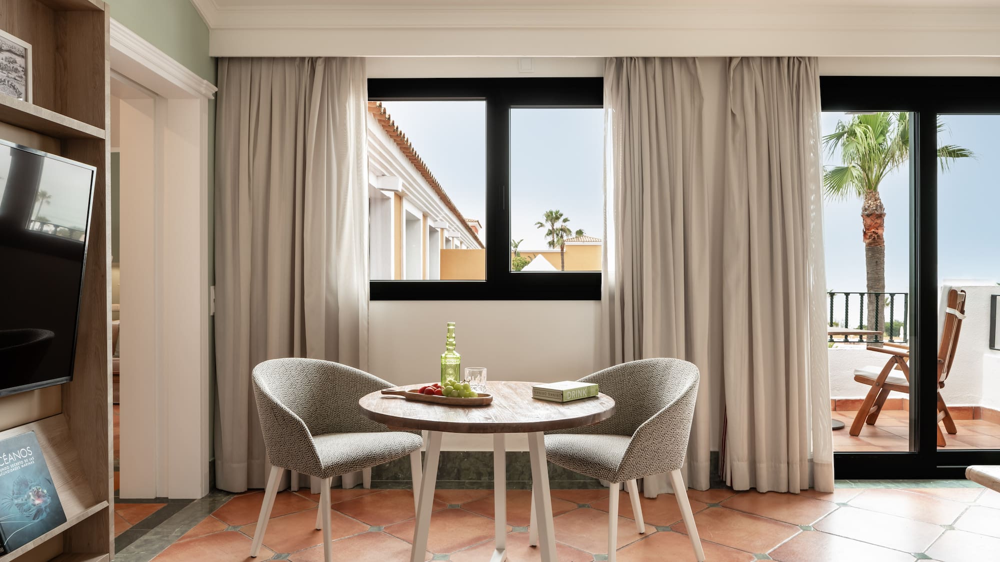 a room with a table and chairs