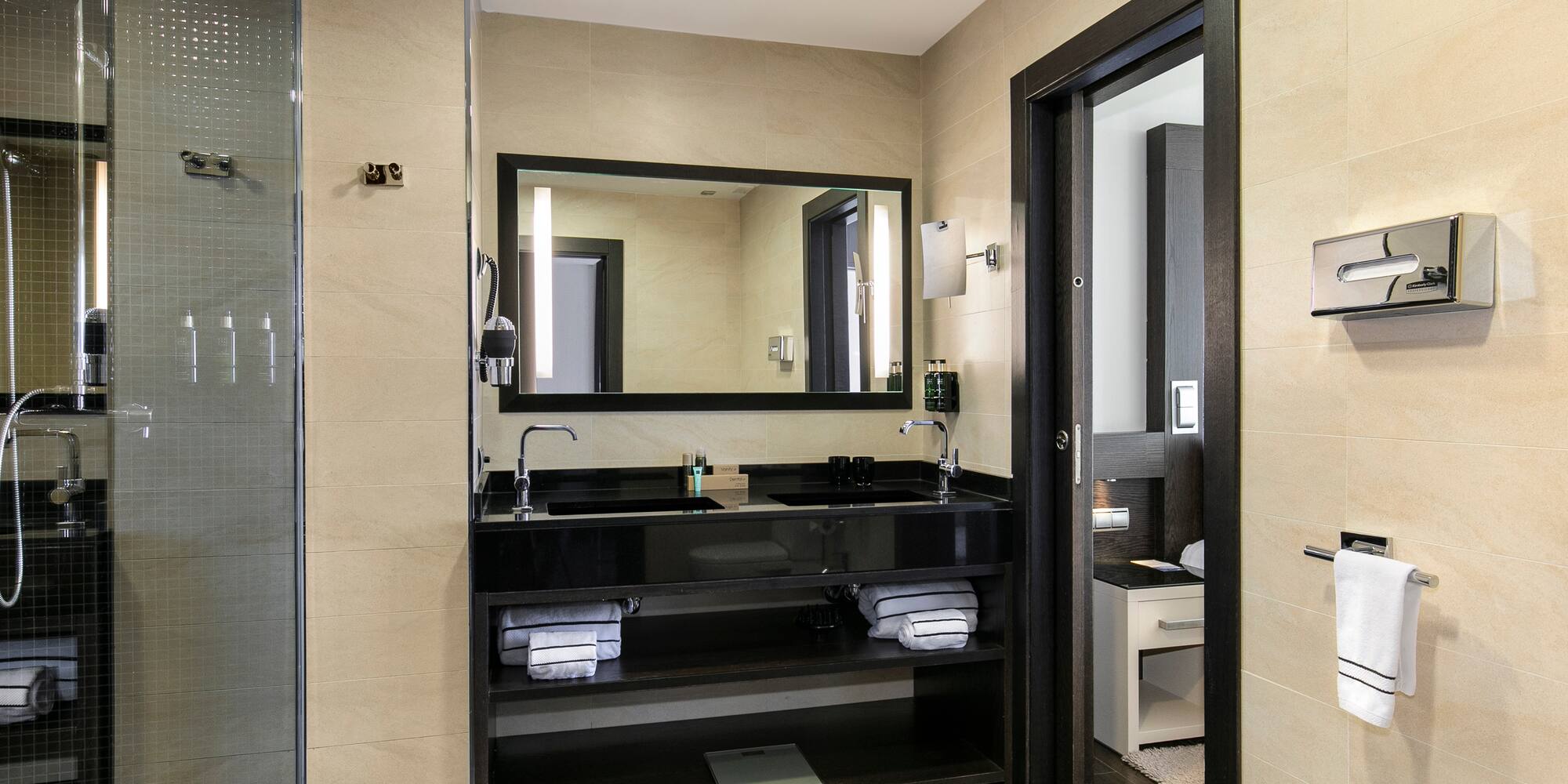 a bathroom with a mirror and sink