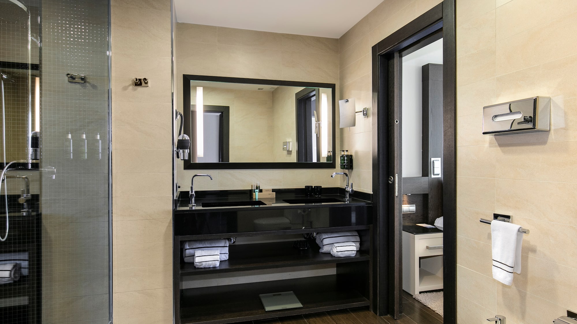 a bathroom with a mirror and sink