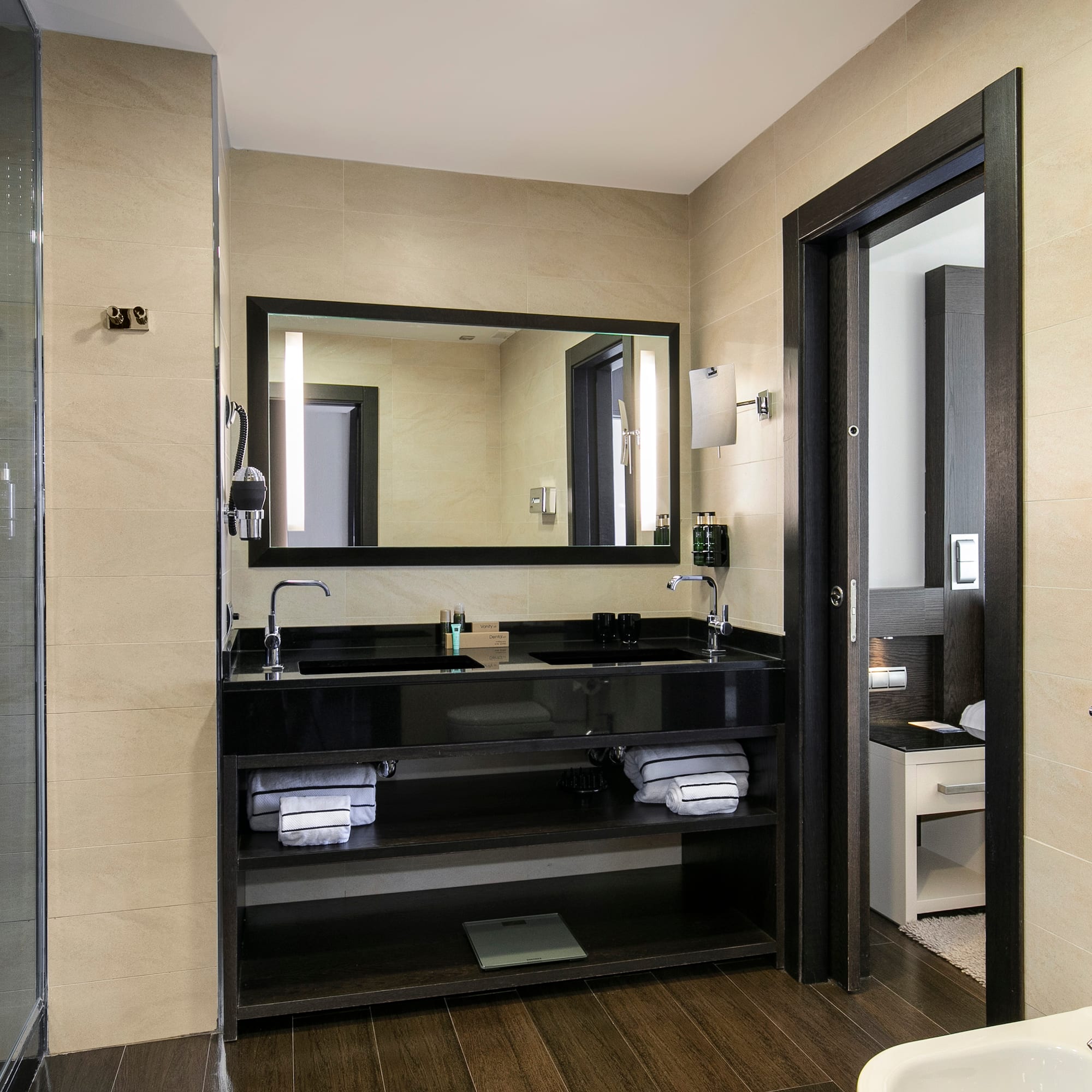a bathroom with a mirror and sink