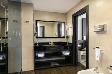 a bathroom with a mirror and sink