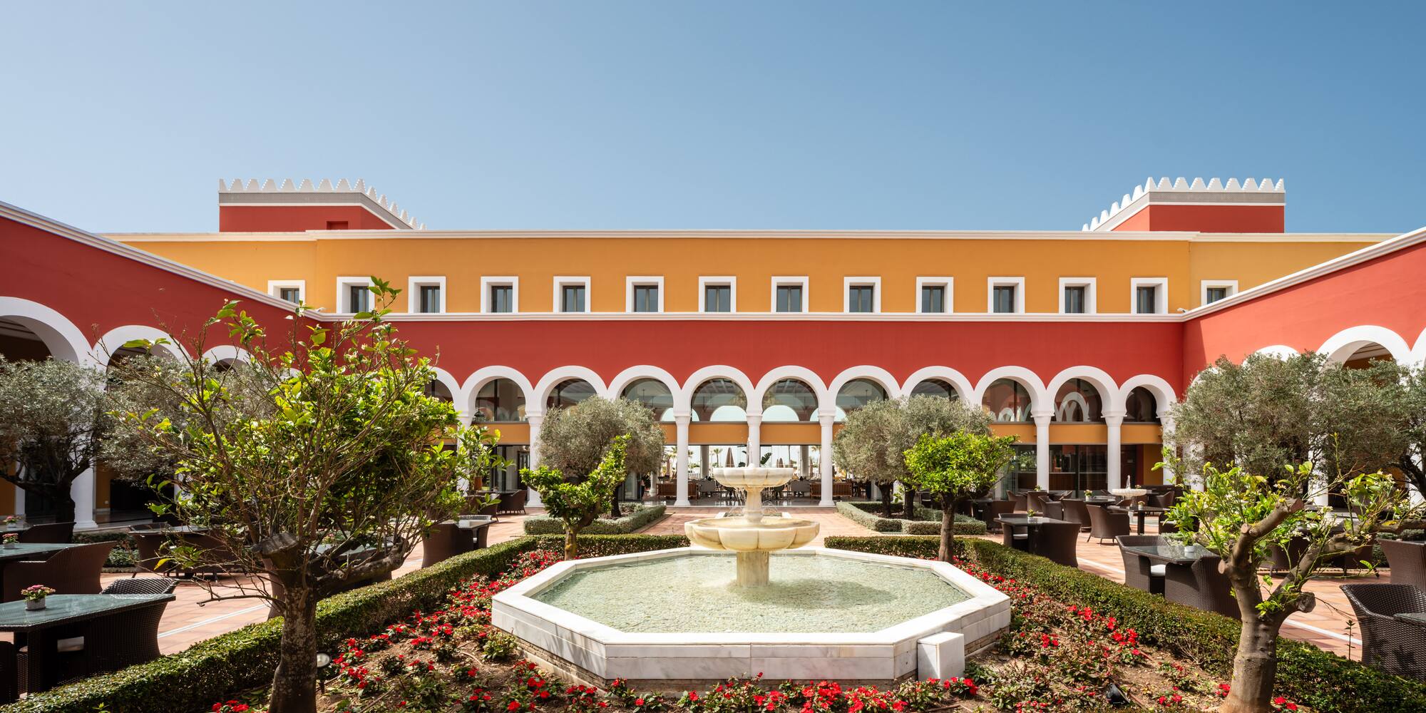 a building with a fountain in front of it