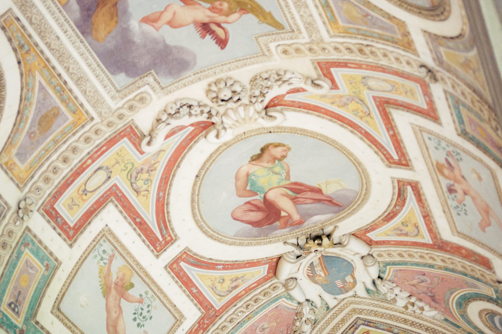 a ceiling with paintings on it