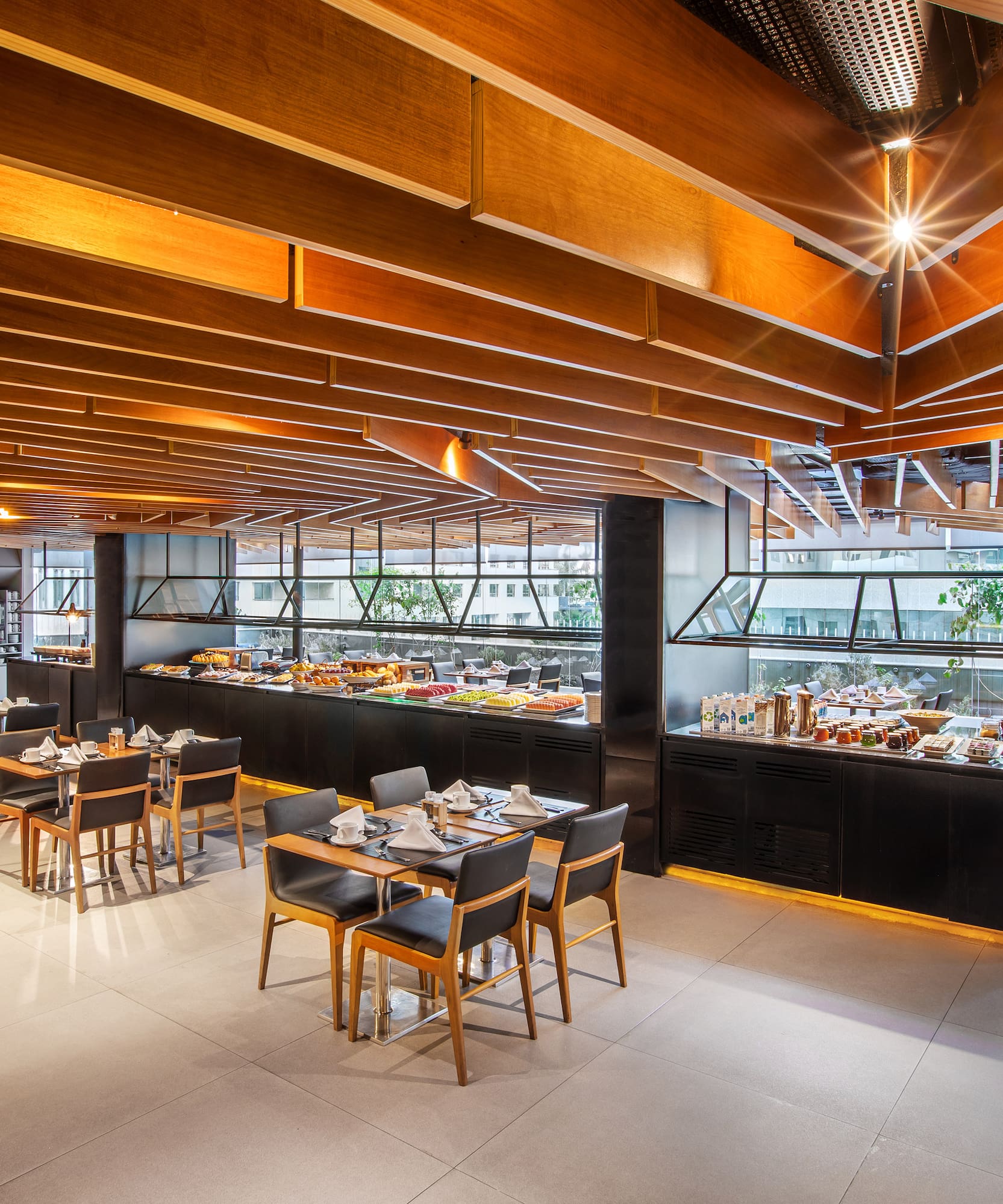 a restaurant with tables and chairs