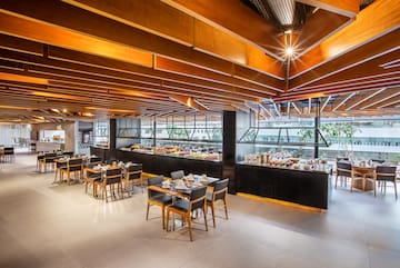 a restaurant with tables and chairs