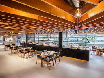 a restaurant with tables and chairs