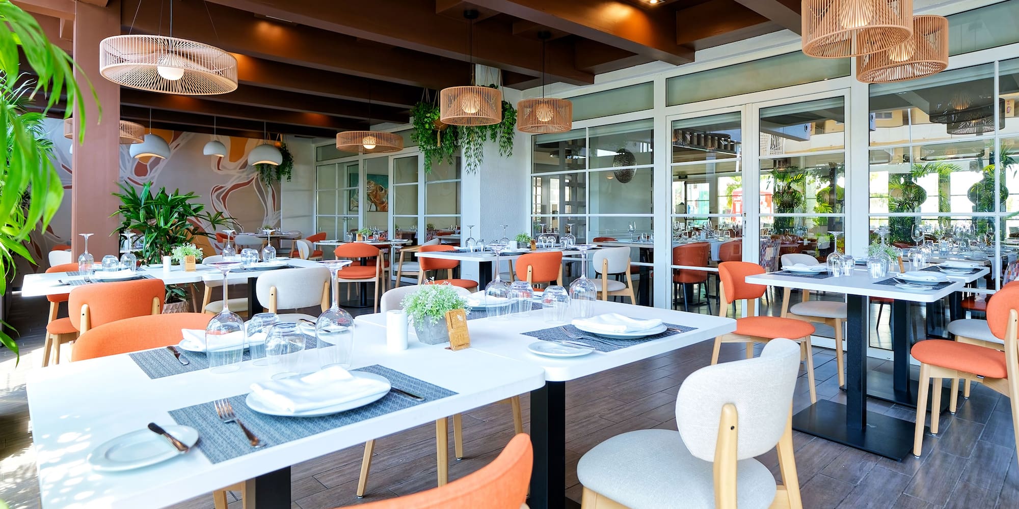 a restaurant with tables and chairs