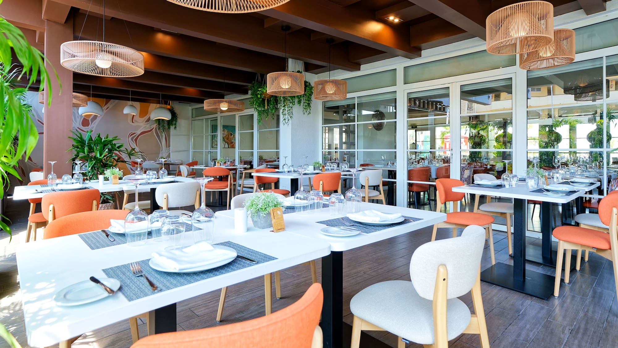 a restaurant with tables and chairs