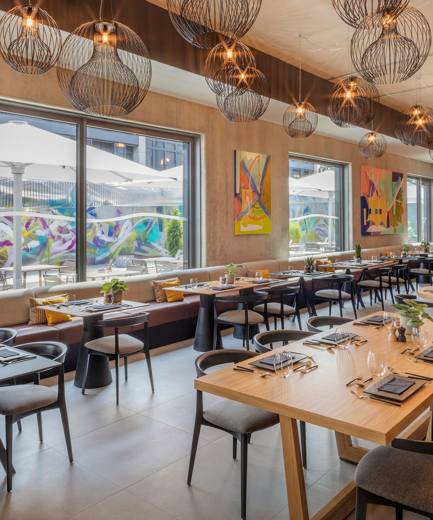 a restaurant with tables and chairs