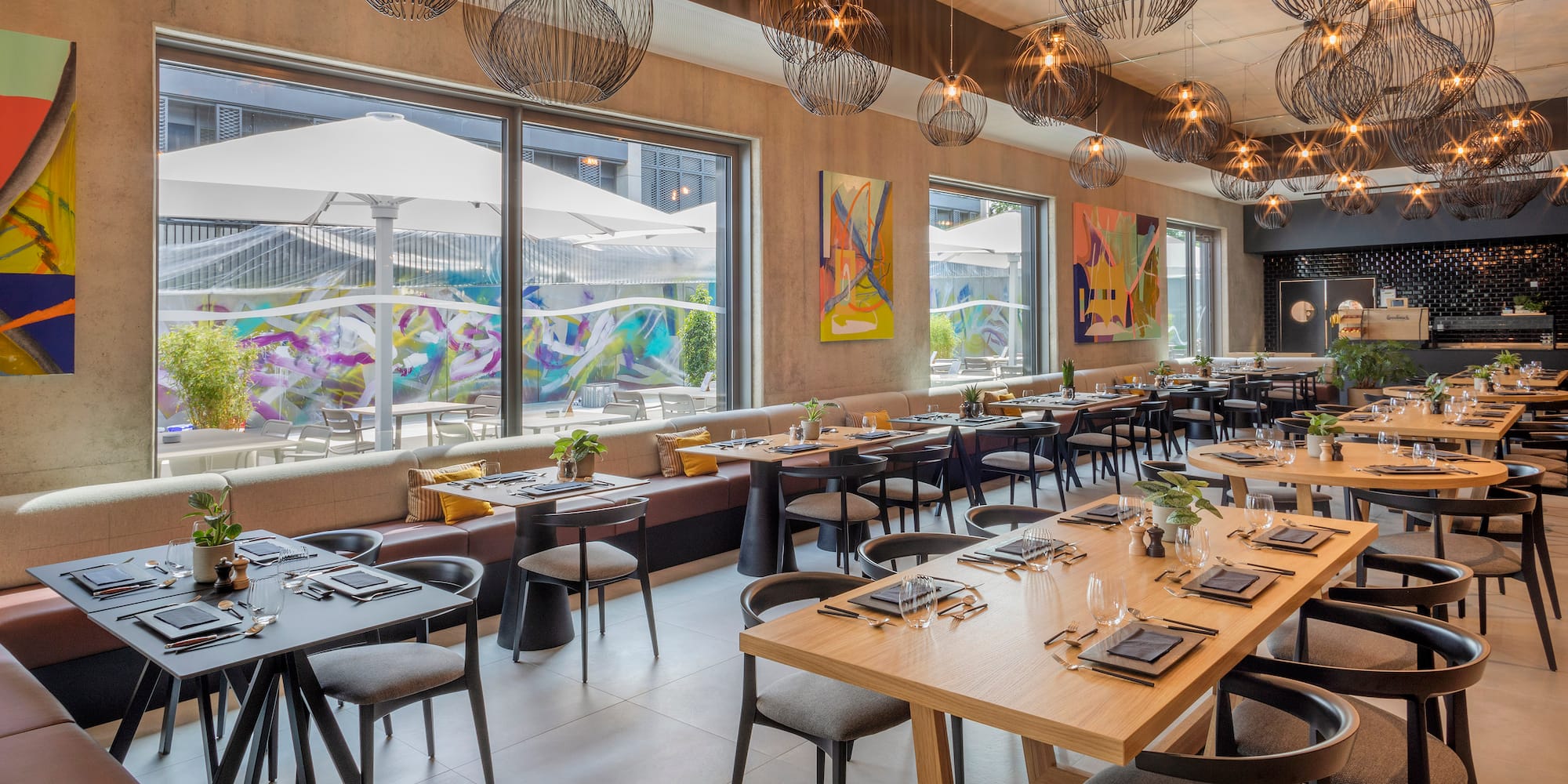 a restaurant with tables and chairs