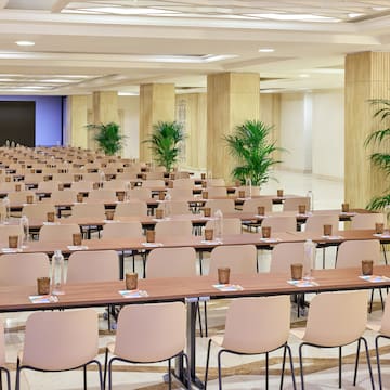 a room with tables and chairs